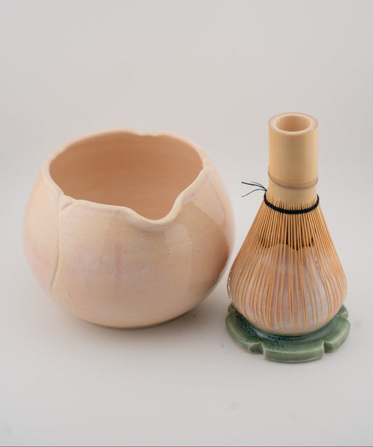 Two ceramic items on a light gray background